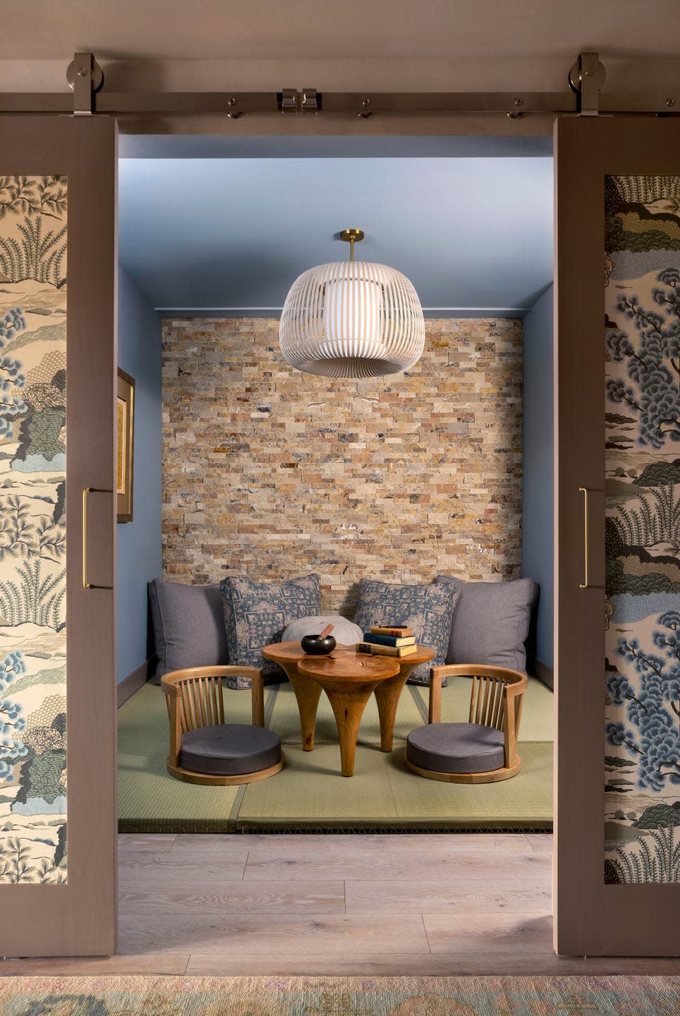 Cozy seating area with a natural wood table and ambient lighting.