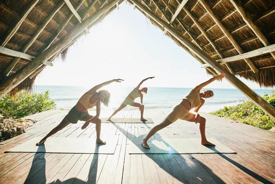 beachfront yoga focused on movement and longevity