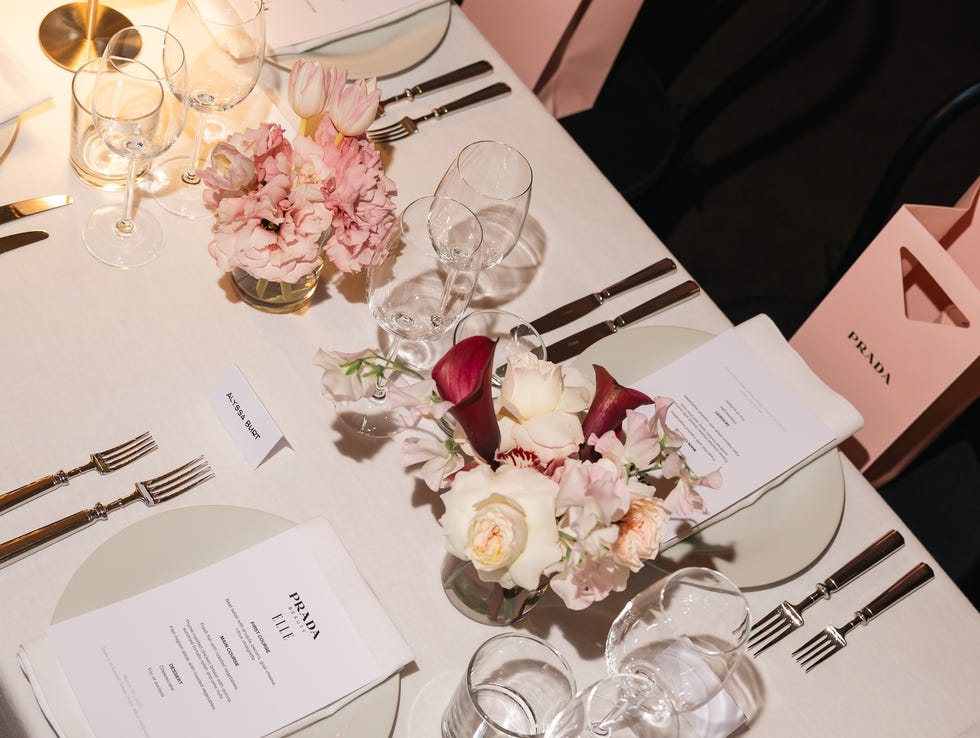 elegant dinner table setting with floral arrangements