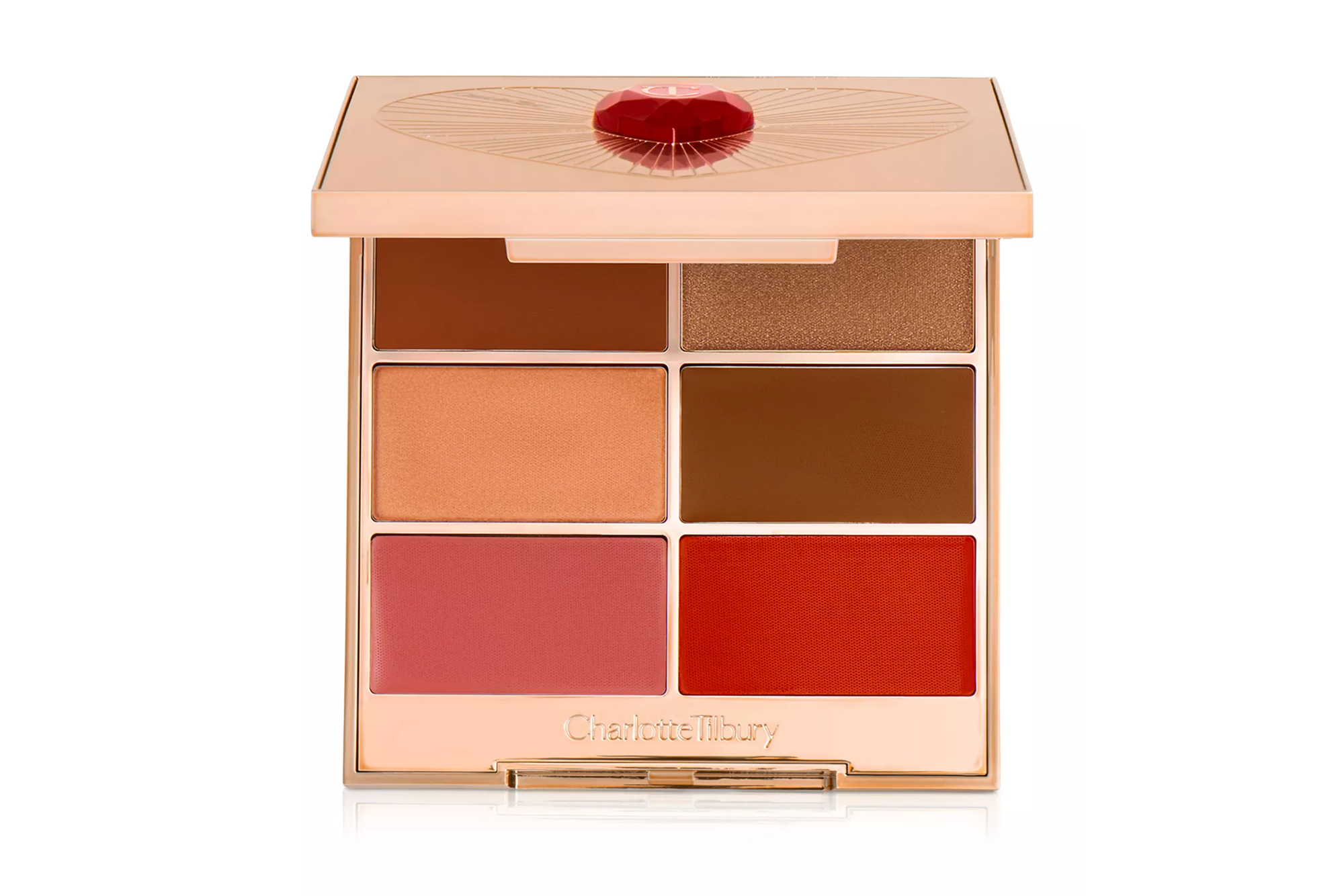 Charlotte Tilbury palette with various shades of bronzer, blush, and highlighter.