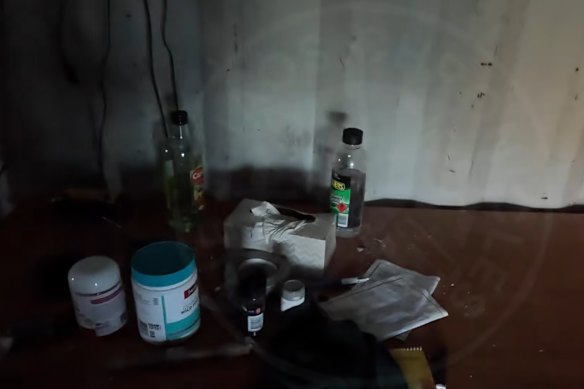 Two vitamin bottles – one of odourless wild fish oil, the other magnesium - sit on a dusty wooden table.