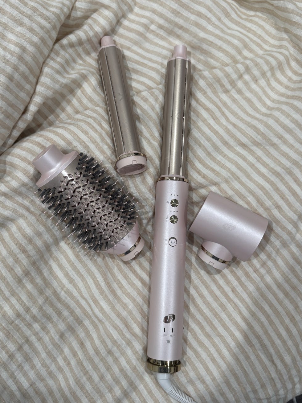 Hair styling tool set including a handle and interchangeable attachments.