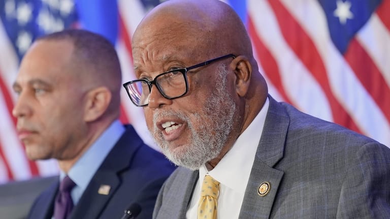 Rep. Bennie Thompson, D-Miss., right speaks as House Minority Leader...