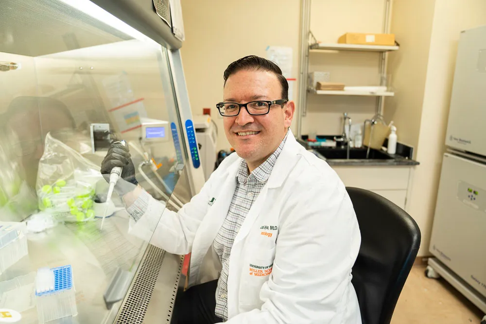 Dr. Justin Taylor working in his lab