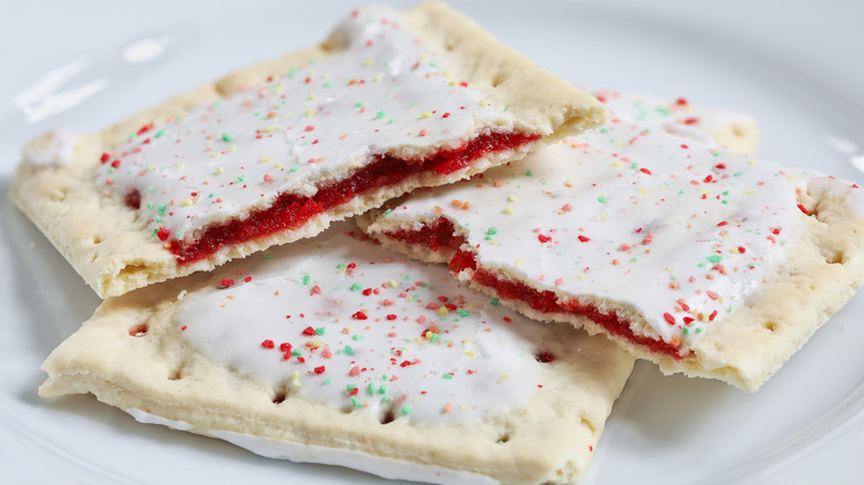 two pop tarts on plate one split