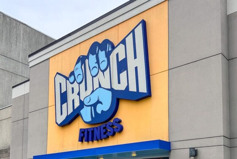 Exterior of Crunch Fitness gym showing entrance