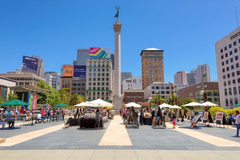 SAN FRANCISCO, CA - JULY 4: Union Square with tourists on July 4, 2014 in San Francisco, California. Union Square is a famous tourist destination and is surrounded by luxury shops.