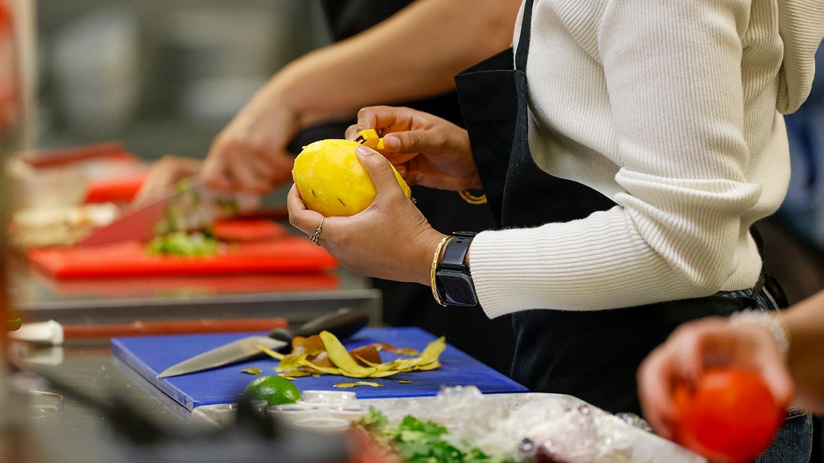 Tulane State Sen. McMath standing inside the Goldring Culinary Center