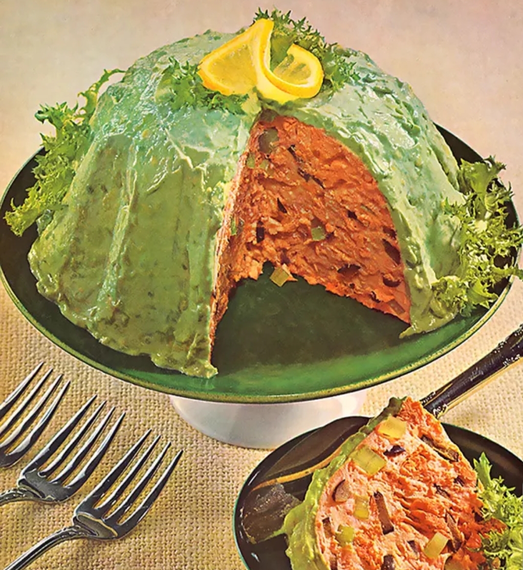 jello mold casseroles, 1970s recipes, retro jello salad, vintage gelatin recipes, savory jello dishes, suspended salad, lime jello salad recipe, tuna jello mold, retro party food, mid century recipes, vintage casserole ideas, 70s food trends, gelatin salad history, weird vintage recipes, jello ring mold