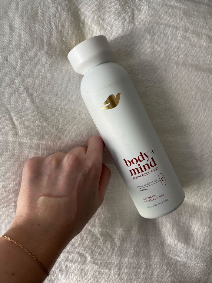 Deputy beauty editor Grace Lindsay testing the Dove Body + Mind Jojoba Oil & Coconut Milk Serum Body Wash