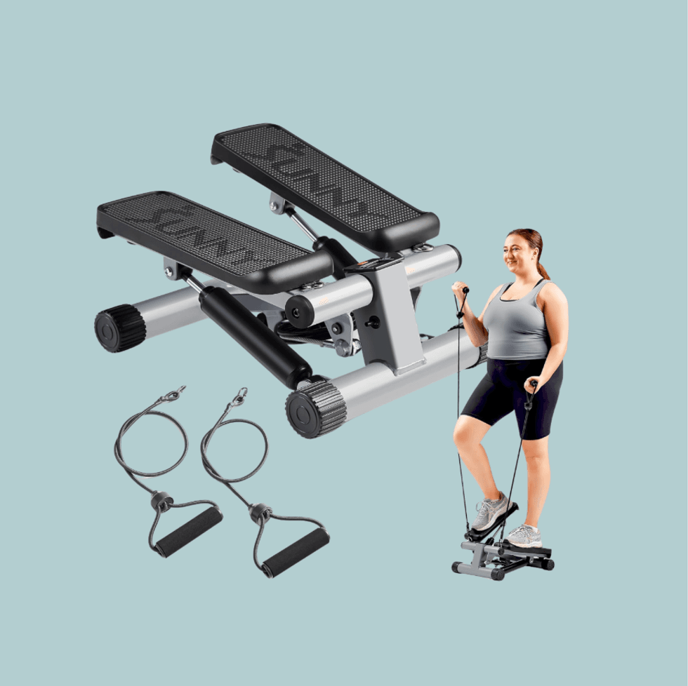 Woman exercising on a step machine with resistance bands.
