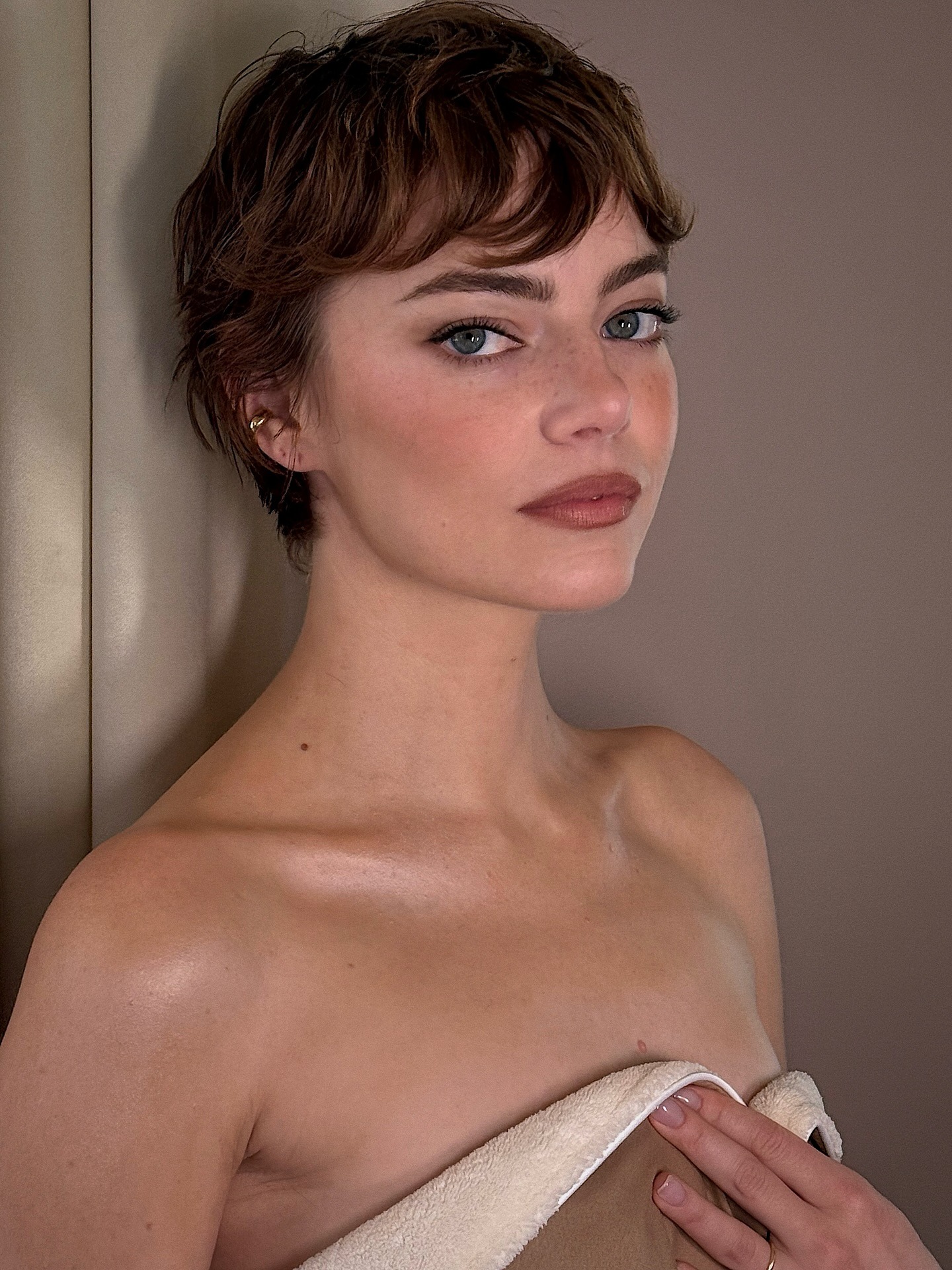 Emma Stone with a wavy elfin bob haircut