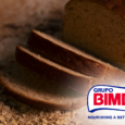 Dark sliced bread and Grupo Bimbo logo