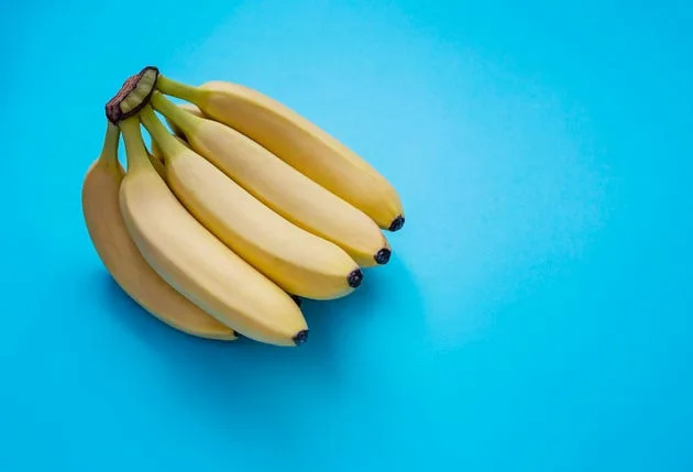 Barely ripe bananas still have a little green near the ends.
