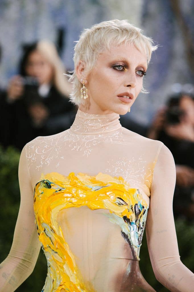 Emma Chamberlain at The 2026 Met Gala Celebrating "Costume Art" held at The Metropolitan Museum of Art  in painted gown