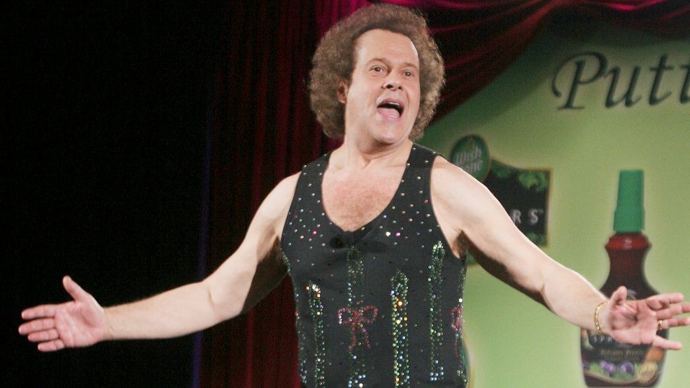 FILE - In this June 2, 2006, file photo, Richard Simmons speaks to the audience before the start of a summer salad fashion show at Grand Central Terminal in New York. (AP Photo/Tina Fineberg, File)