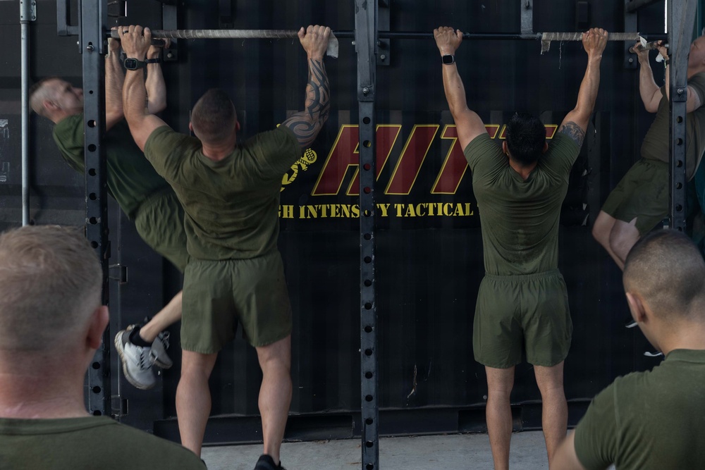 Marines attending 1st Sgts. Symposium Conduct physical training