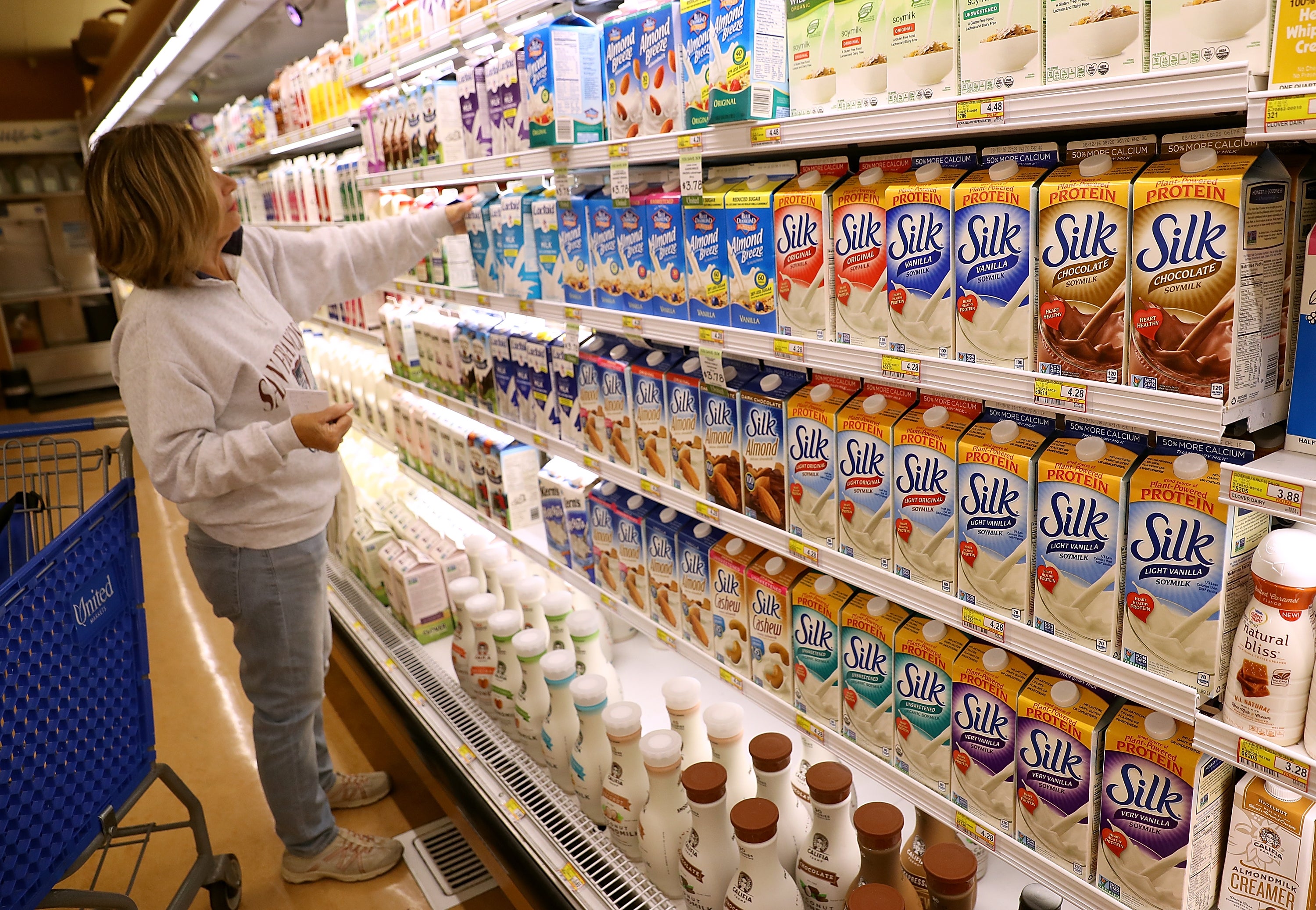A woman shops for soy milk in Northern California in July 2016. Just a cup of chocolate soy milk has more than half of the daily recommend vitamin B12 for adults