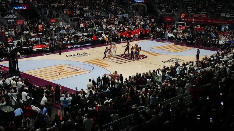 The Toronto Tempo and the Washington Mystics line up for...
