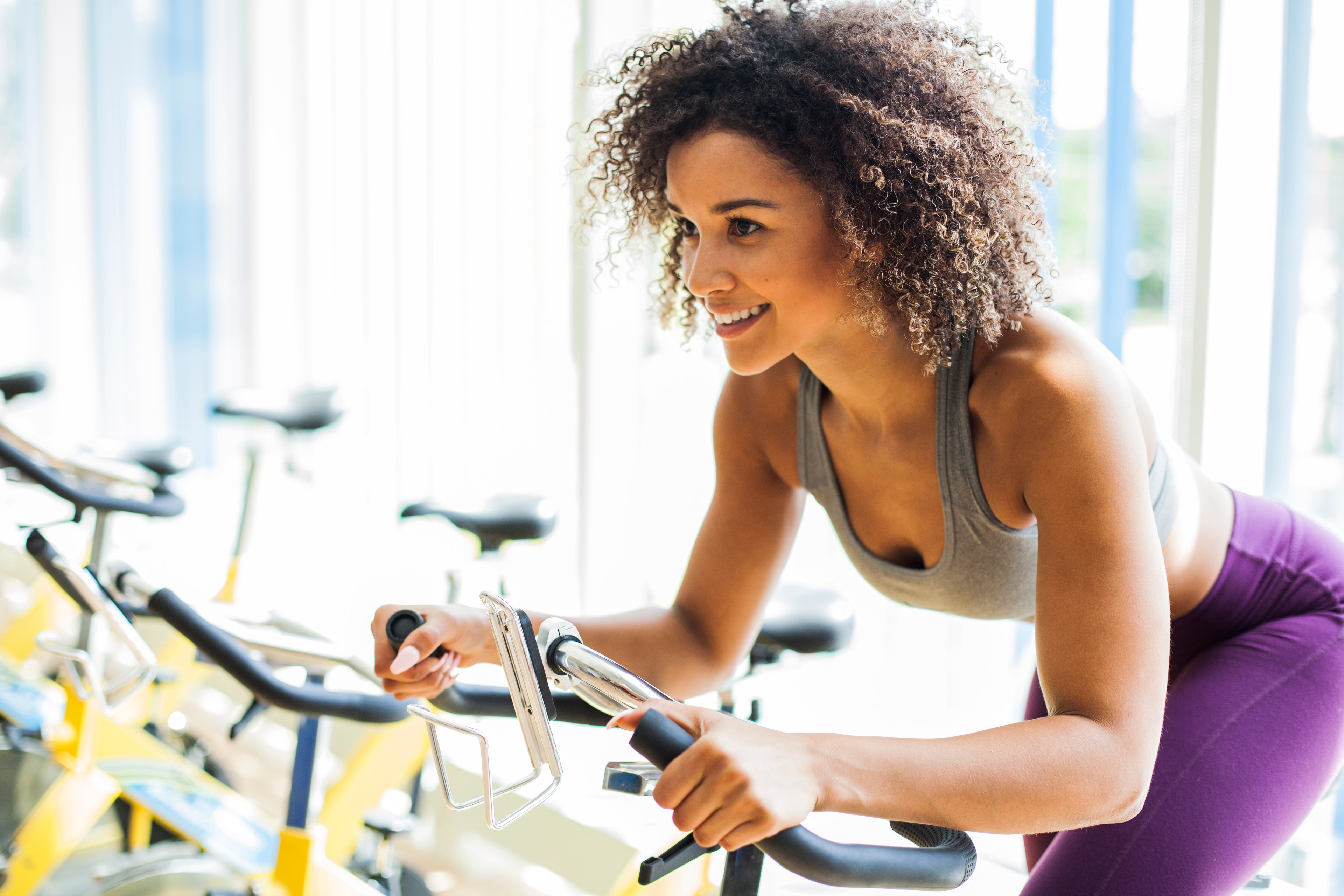 Riding an exercise bike.