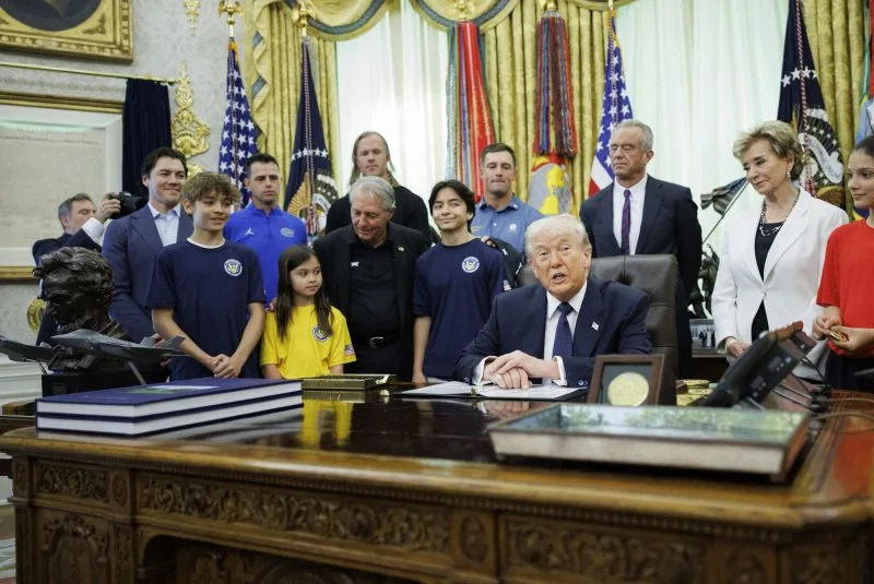 President Donald Trump signs a proclamation Tuesday inside the Oval Office at The White House in Washington, D.C. Photo by Tom Brenner/UPI