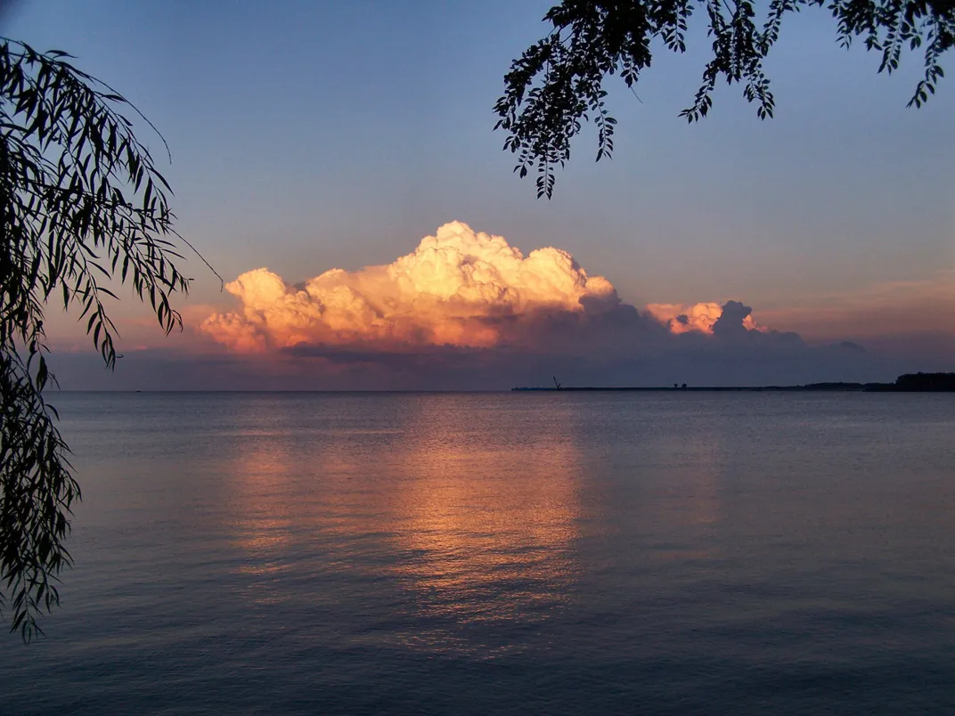 A billowing cloud hovers above Lake Erie.