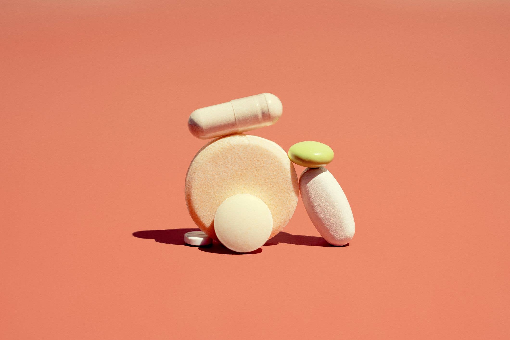 A group of pharmaceutical drugs pills laid in a pile