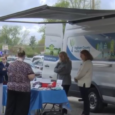 State health director visits Ingham County Wellness Center, mobile health units