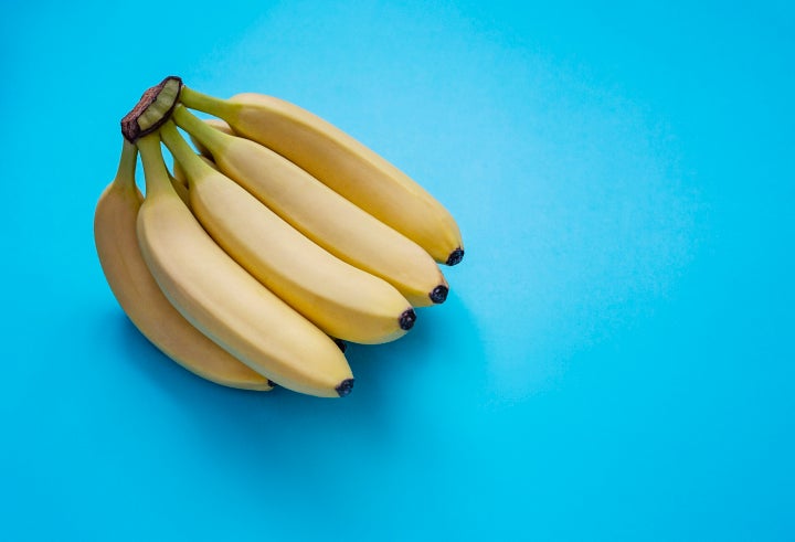 Barely ripe bananas still have a little green near the ends.