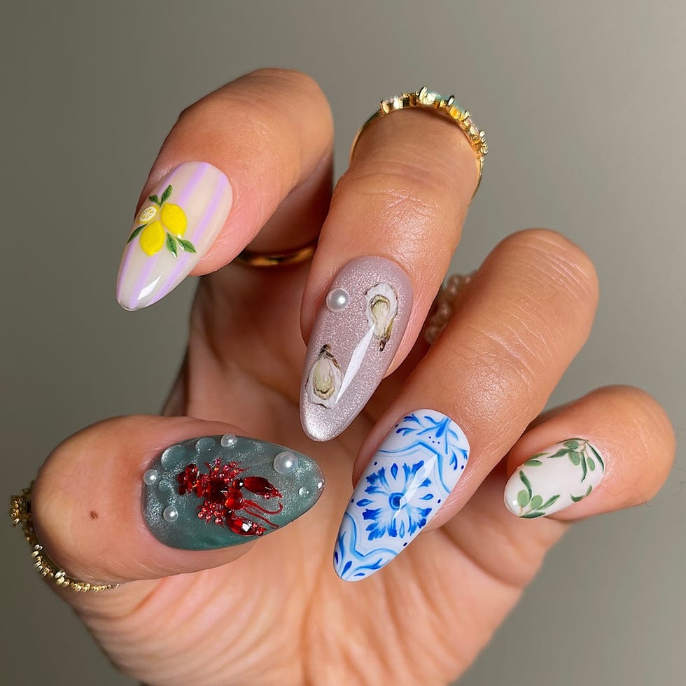Colorful and artistic nail designs on hand. Colorful and artistic nail designs on hand.