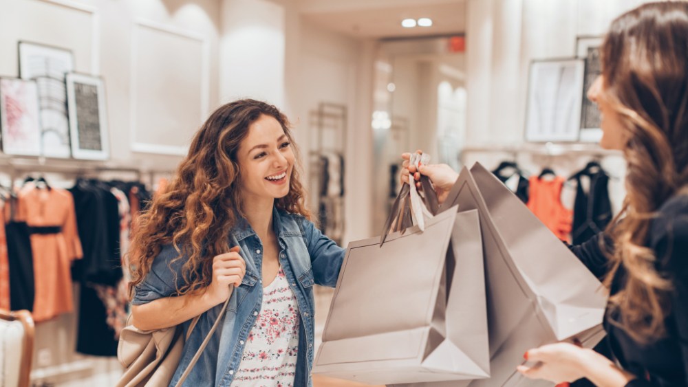 Consumers say they'll spend more this summer than a year ago, with clothing being a leading category.