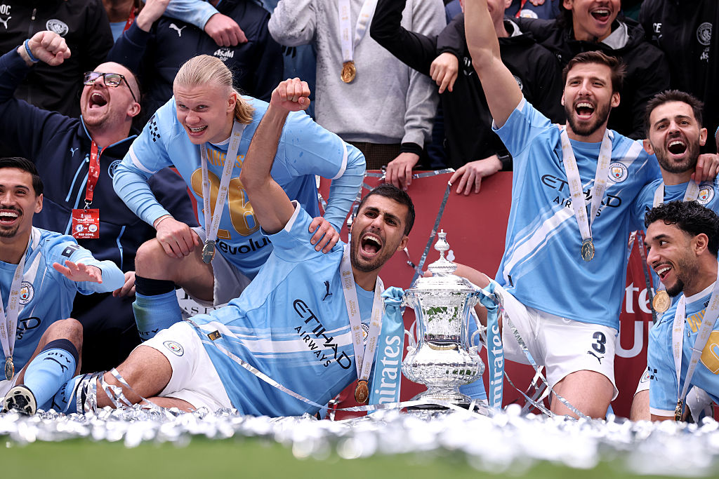 Man City midfielder Rodri celebrates with his team-mates