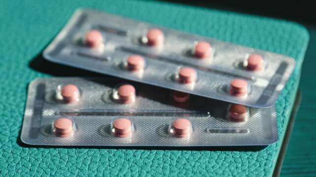 hrt blister packs on a green bench 