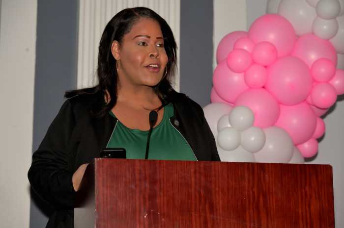Chanel Lopez, the deputy director of LGBTQ+ Affairs for Gov. Kathy Hochul, delivers remarks at NYTAG's summit.