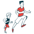 A man and a child run alongside each other.