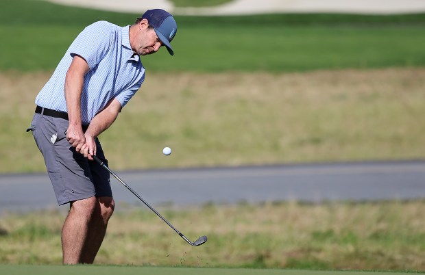 Former Santa Cruz High and San Jose State standout Isaac Weintraub chips onto Pasatiempo's first hole during the U.S. Open Local Qualifying on Wednesday. Weintraub shot par on the hole, (Shmuel Thaler - Santa Cruz Sentinel)