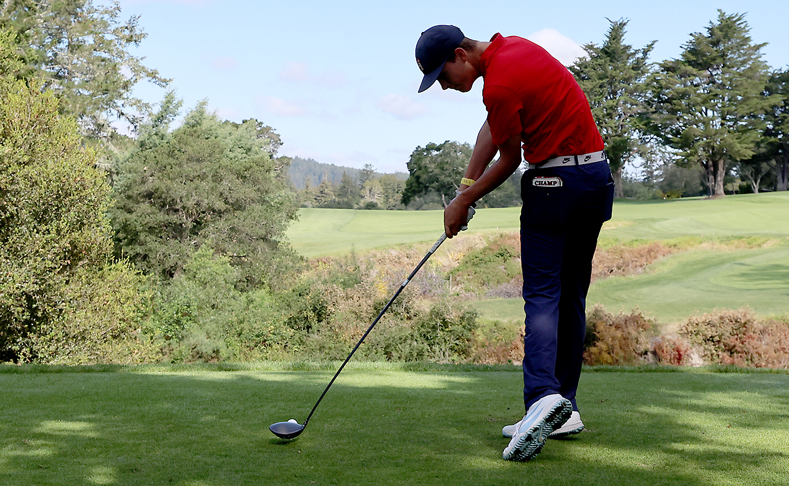 Lucius Niesen, of Scotts Valley, hits his tee shot on...