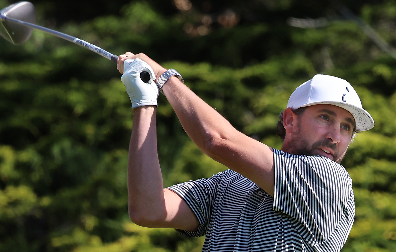Casey Ramback, of Aptos, tees off on the second hole...