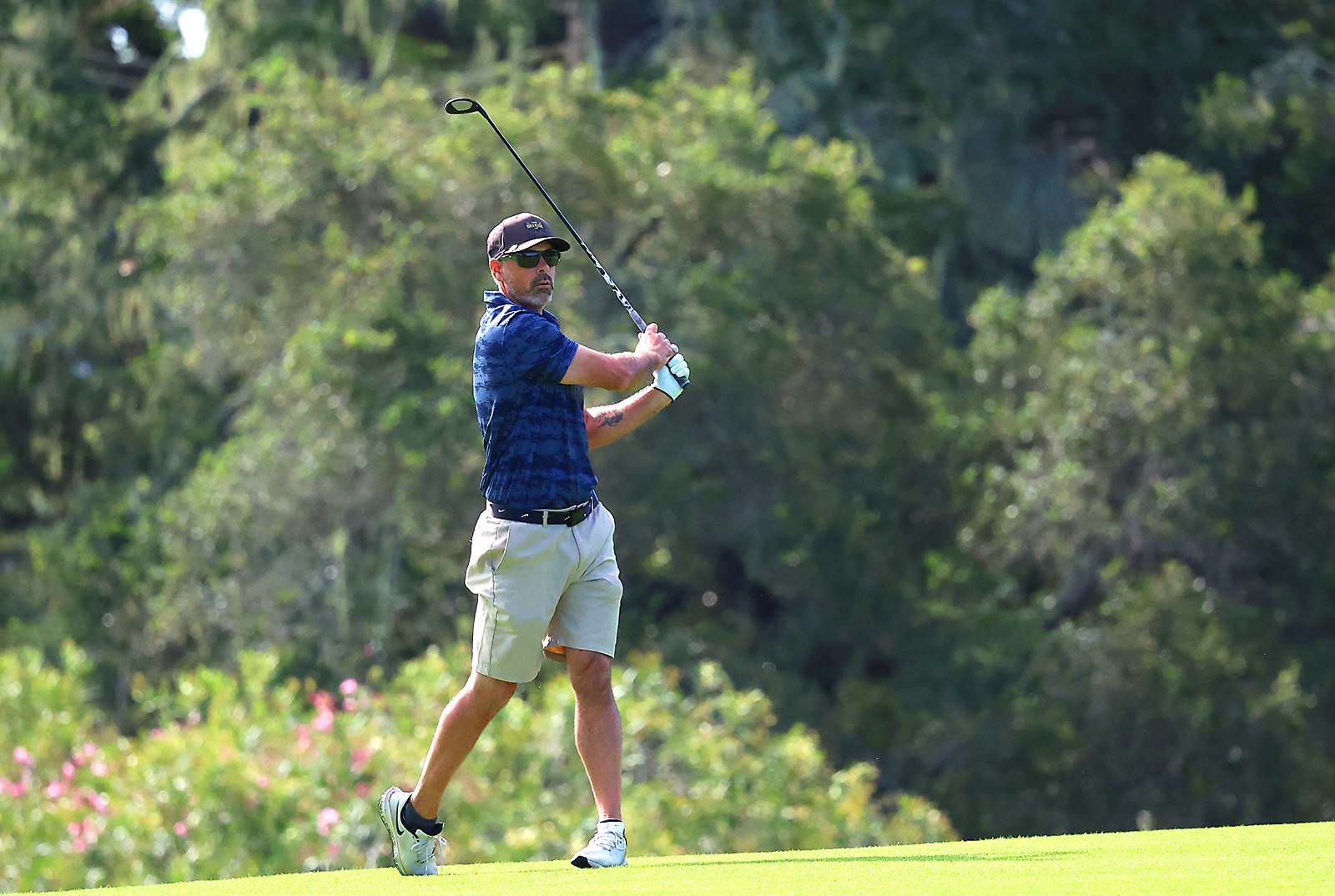 Chris Audi, of San Fransisco, hits his second shot on...