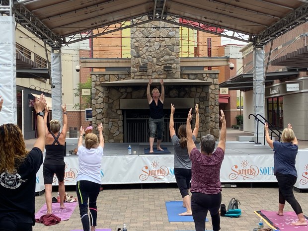people doing yoga 