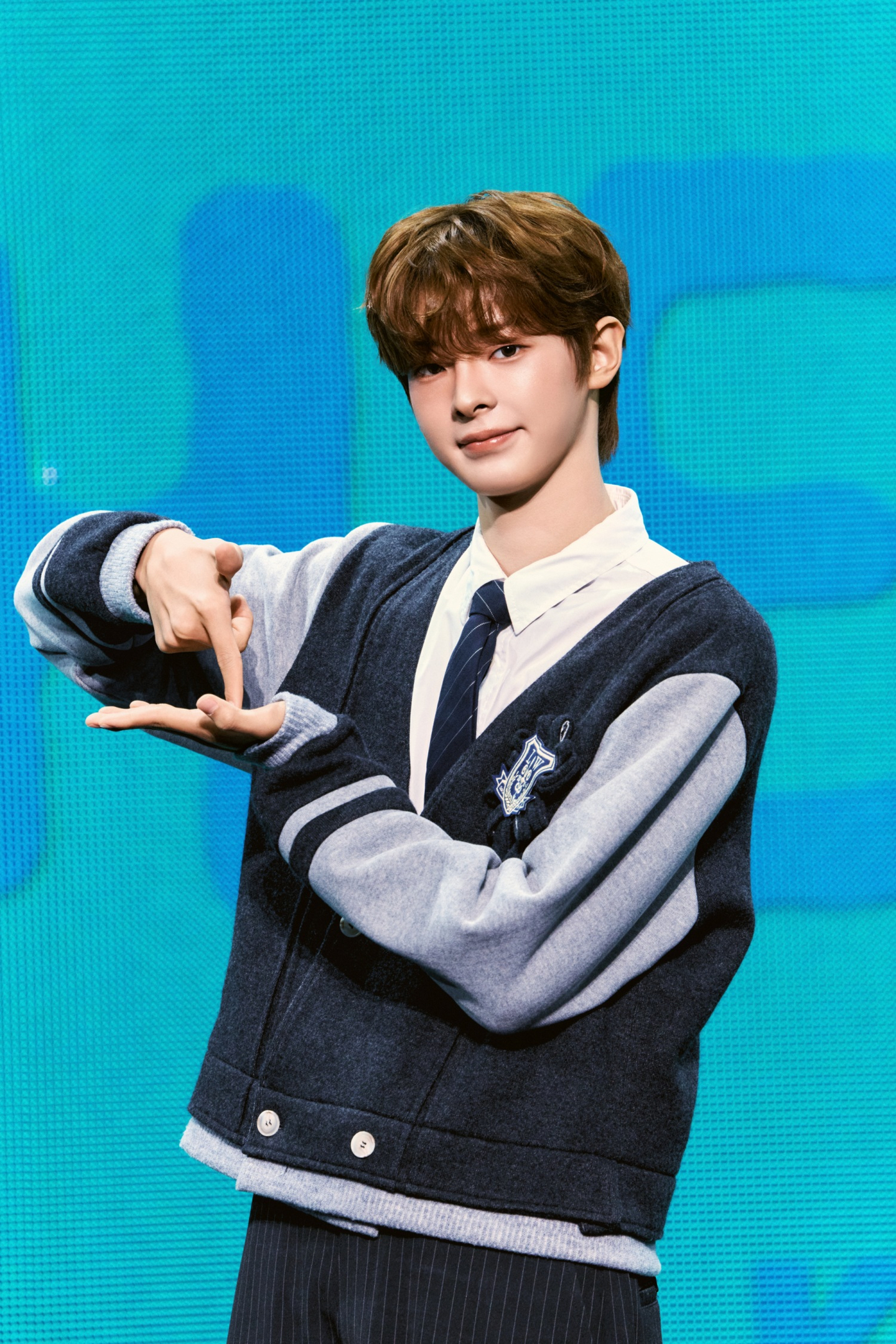 Kang Woo-jin of Flare U poses for a photo during the duo's debut showcase held at Blue Square Woori WON Banking Hall in Yongsan District, central Seoul, on May 13. [FNC ENTERTAINMENT] 