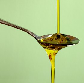 Opt for a drizzle of olive oil and lemon over a salad, or incorporate it into a well-balanced meal, before you resort to shotting it. 