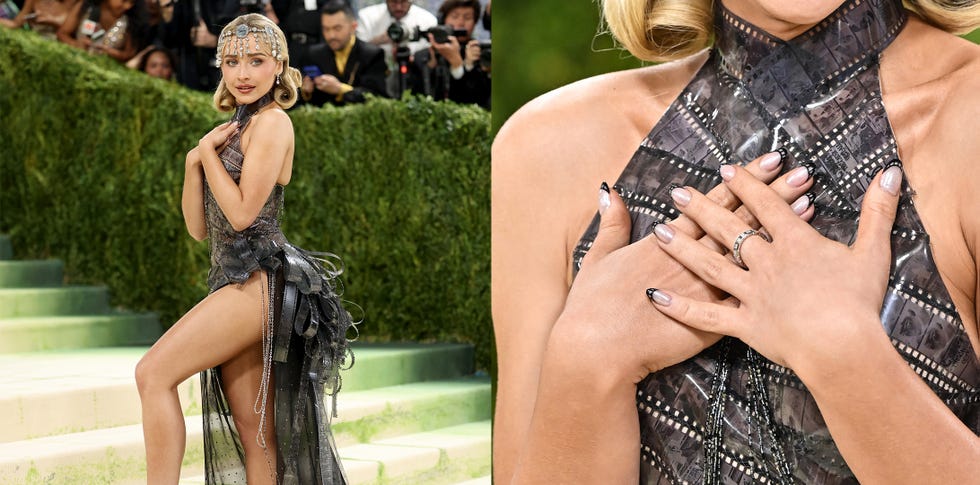 Celebrity wearing a striking outfit at a high-profile event.