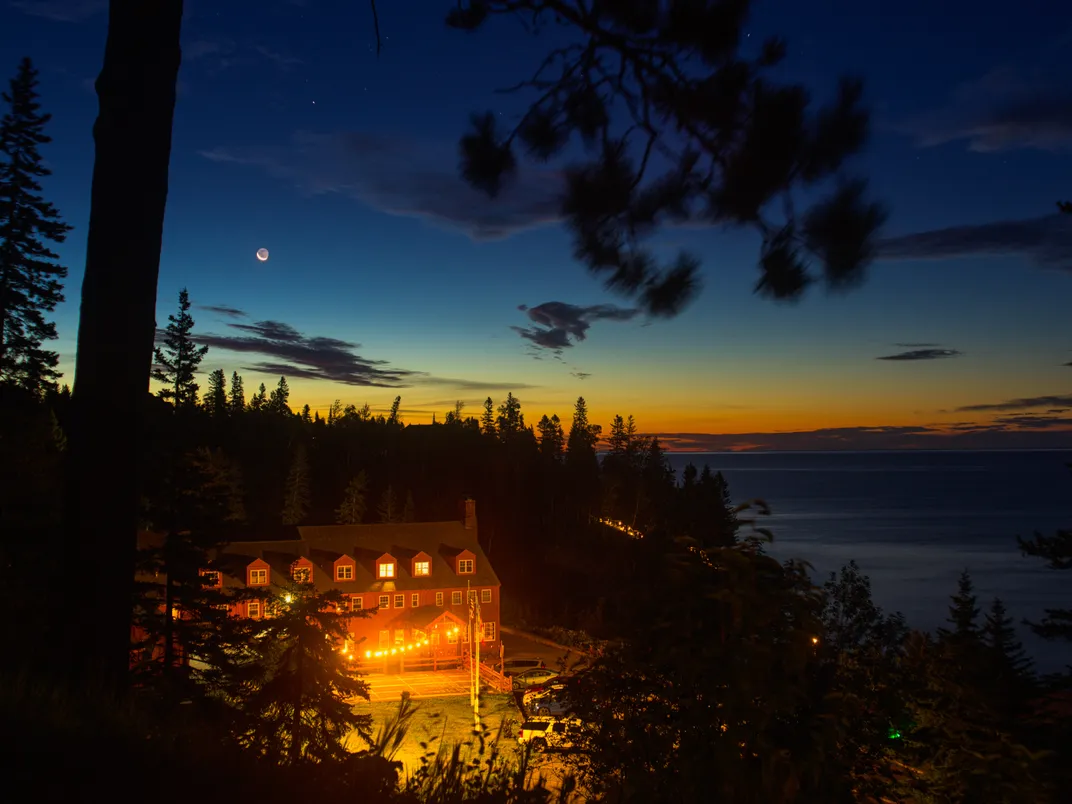 A lodge next to Lake Superior at sunset
