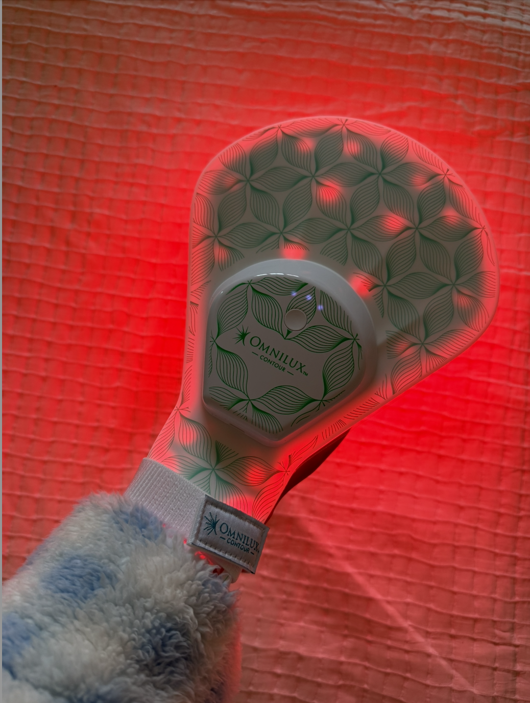 Imani testing the Omnlix hand LED mask
