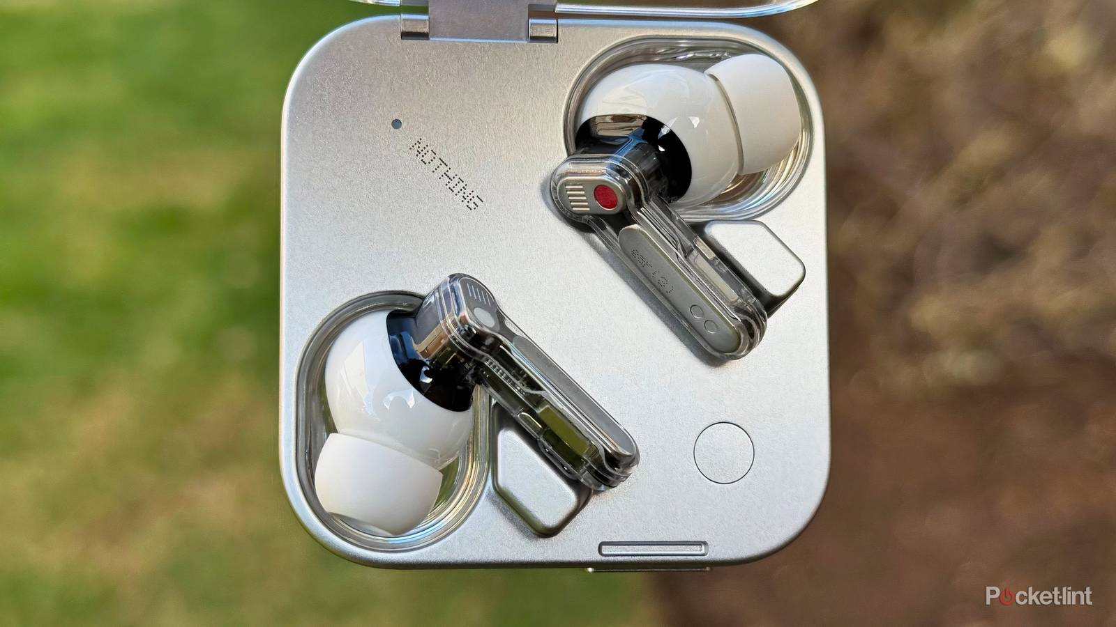 These $180 translucent earbuds have me missing tech's funky era
