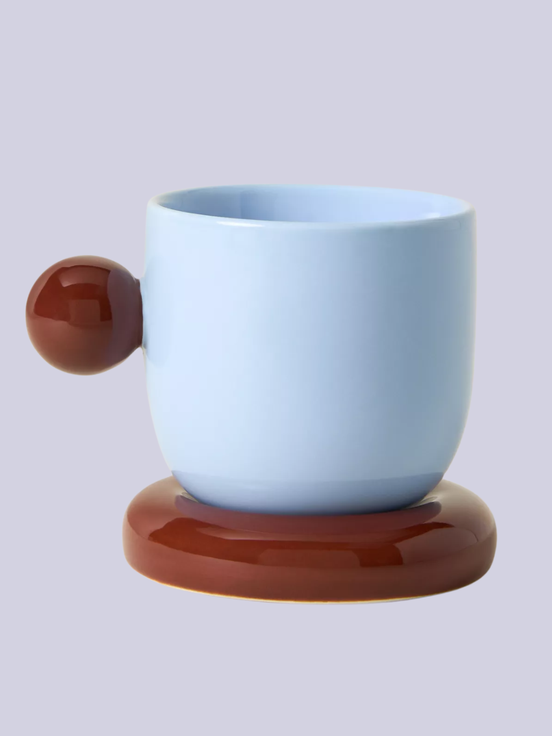 A blue and brown espresso cup
