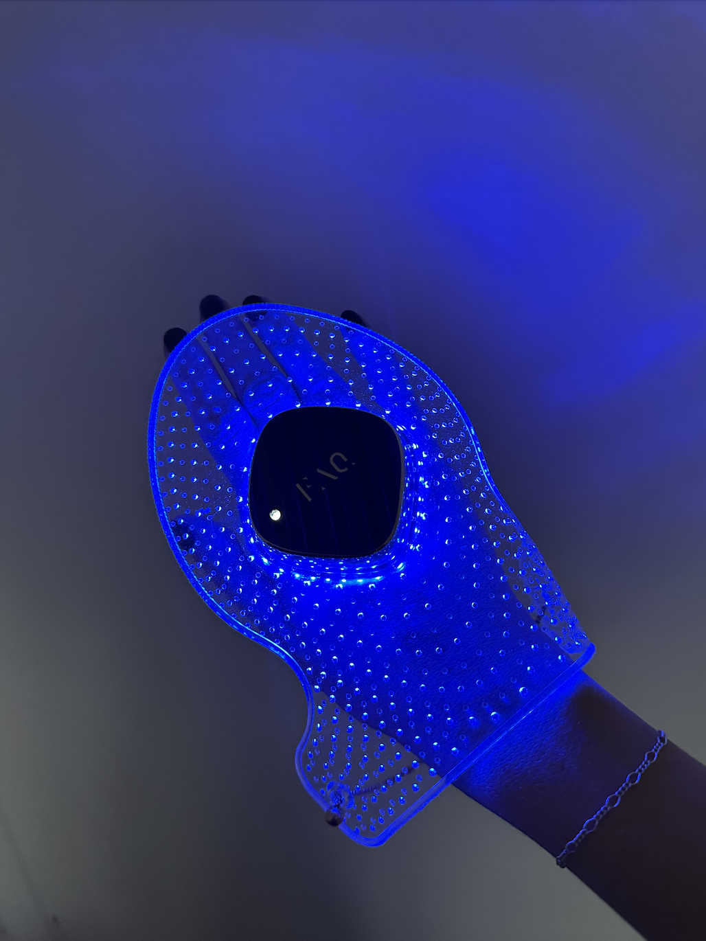 A photo of Megan testing the Foreo FAQ LED hand mask