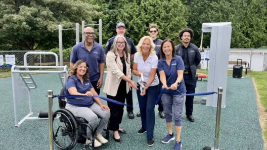 From left: White Rock Coun. Susan Bains, Coun. Bill Lawrence, Peace Arch Hospital Foundation executive director Stephanie Beck, White Rock firefighter Cory McKinnon, Mayor Megan Knight, firefighter Logan Watson, Coun. Elaine Cheung and firefighter Tyler Abiew at the grand opening of new fitness equipment at Centennial Park in White Rock Wednesday (June 3). (Tricia Leslie photo)