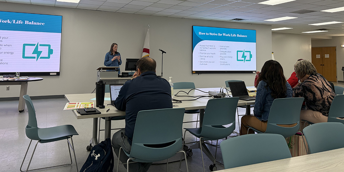woman leads presentation in classroom data-lightbox='featured'